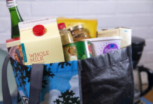 Groceries in a shopping bag, representing grocery cash back with Ibotta