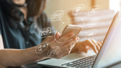 Woman using digital banking illustrating the SoFi Checking and Savings review