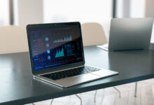 Reviewing an automated investment portfolio on a laptop